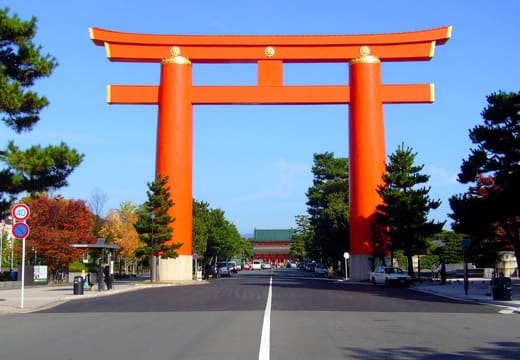 The giant vermilion torii of Heian Shrine standing over the Jingu-michi avenue, Kyoto