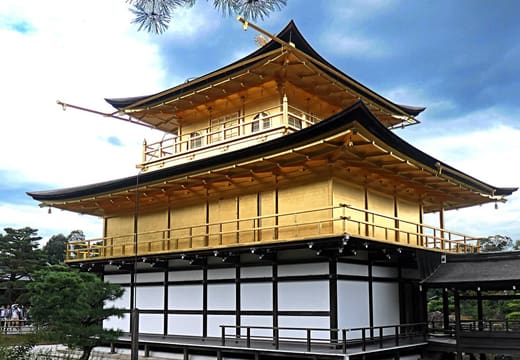 A closer view of the gold-leaf upper floors of Kinkaku-ji