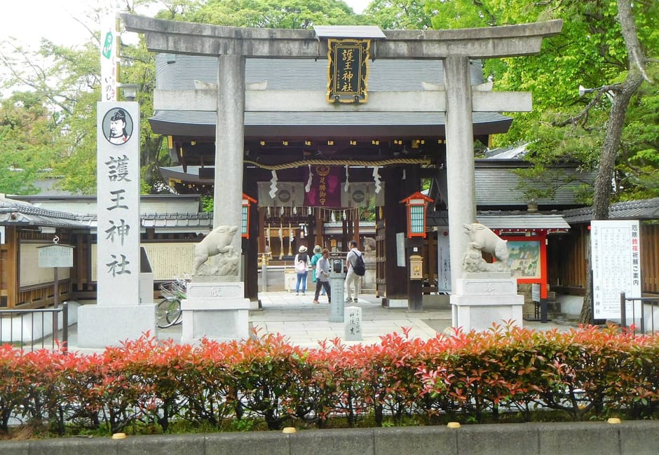 The stone torii and main hall of Goo Shrine on Karasuma-dori, Kyoto