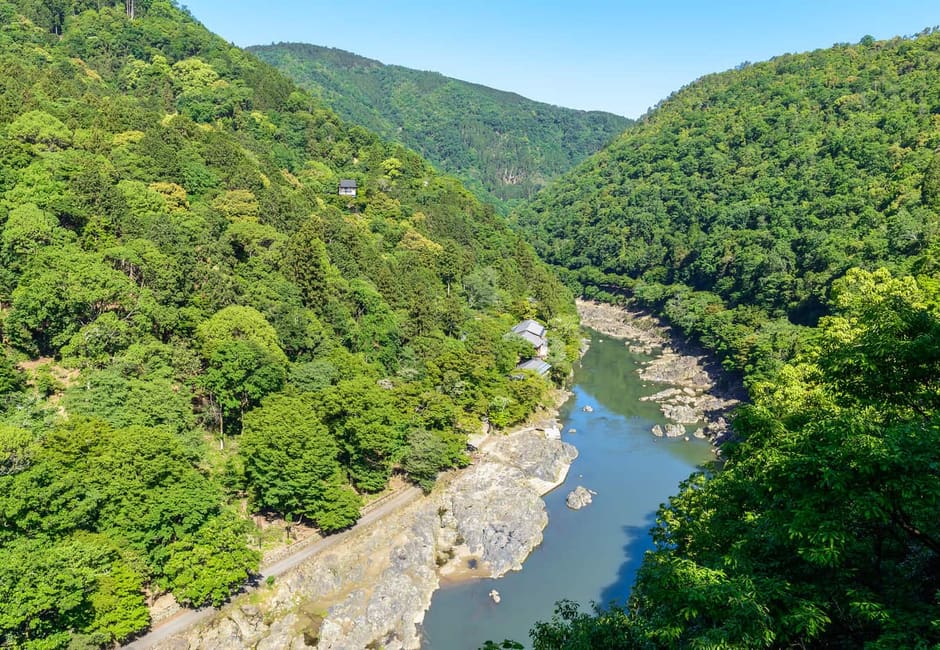The view from Kameyama in Arashiyama Park up the wooded Hozu gorge and river
